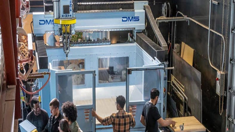 People working in the CNC Machine Shop.